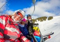 Family riding ski lift cable car on winter vacation skiing Royalty Free Stock Photo